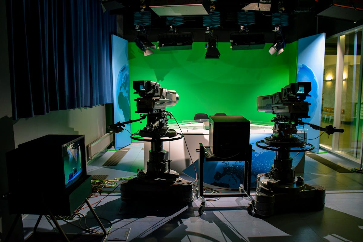 TV broadcast studio with cameras and green screen — Pakistani drama production